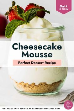 cheesecake mousse in a glass jar with whipped cream and strawberries on top