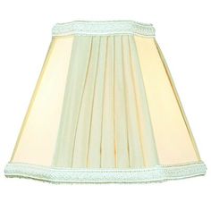 a lamp shade that is white and has a light blue trim around the bottom of it