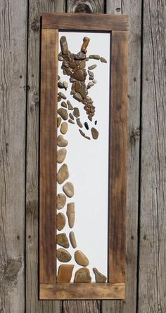 a wooden frame with some rocks in it