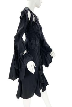 For Sale on 1stDibs - Tom Ford for Yves Saint Laurent Rive Gauche Skirt Suit S/S 2003 Runway Collection - Look 9 French size 38 - US 6 100% Silk, Black Color. Top - Cutout Details, Silk Fitted Skirt With Ruffles, Designer Silk Skirt, Designer Fitted Silk Skirt, Yves Saint Laurent 90s Runway, Saint Laurent Runway 90s, Vintage Ysl Dress, Vintage Yves Saint Laurent Dress, Yves Saint Laurent Black Dress, Black Skirt Suit