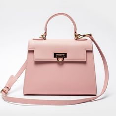 Feminine Pink Top Handle Bag -Chic & Versatile. Introducing our latest collection addition, Layla Bag in Pink. Lean into the femininity of a soft pink bag, perfect for spring and summer. This new-season Enjoy the versatility of Layla Bag with its adjustable strap, allowing you to wear it comfortably as a crossbody or shoulder bag, depending on your style preference. Bag Specifications Material: Vegan leather Interior: Luxurious suede lining Handles: Single handle, Removable shoulder strap Hardwa Spring Formal Satchel With Double Handle, Formal Top Handle Shoulder Bag For Spring, Luxury Pink Flap Bag With Double Handle, Classic Pink Bag For Formal Occasions, Luxury Pink Double Handle Flap Bag, Classic Pink Bags For Formal Occasions, Elegant Pink Box Bag For Evening, Classic Pink Formal Bag, Elegant Pink Evening Box Bag