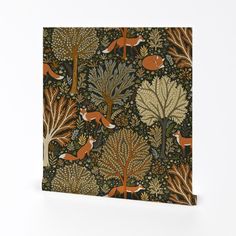 a card with foxes and trees on it