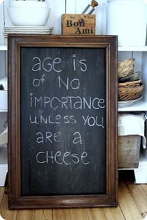 a chalkboard sign that says age is not important unless you are a cheese