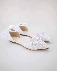 FIT: STYLE RUNS LARGE, ORDER 1/2 SIZE SMALLER  Crochet lace pointy toe flats for comfortable wear throughout your special day. We've added satin lace up ribbon to make this a ballerina shoe. Perfect wear as bridal shoes, bridesmaids, mother of the bride, bridal shower, romantic dining, or any of your special events. ** YOU CAN CHOOSE TO DO ANKLE STRAP IN SATIN BALLERINA LACE UP, ORGANZA BALLERINA LACE UP, ANKLE STRAP OR PEARLS ANKLE STRAP- OPTION IS AVAILABLE AT CHECKOUT ** DETAILS: COLORS AVAIL Flat Wedding Shoes For Bridal Shower In Spring, Summer Wedding Flats With Round Toe, Spring Wedding Flats With Flat Heel, White Flat Bridesmaid Wedding Shoes, Summer Wedding Ballet Flats With Low Heel, Flat Wedding Shoes For Bridal Shower, Spring Wedding Closed Toe Flats, Elegant Lace-up Wedding Sandals, White Flat Heel Bridesmaid Wedding Shoes