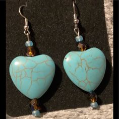 One Pair Of Natural Turquoise Heart-Shaped Earrings . Length: 1 3/4” Long Any Questions? Feel Free To Ask. Like The Item But Not The Price? Send Me An Offer. All Items In My Closet Are Buy 2 Get 1 Free. Blue Bohemian Heart Earrings For Gift, Bohemian Blue Heart Earrings For Gifts, Blue Bohemian Heart Earrings As Gift, Bohemian Blue Heart Earrings As Gift, Blue Handmade Heart Drop Earrings, Handmade Blue Heart Drop Earrings, Blue Heart-shaped Earrings With Ear Wire, Nickel-free Blue Heart Earrings, Blue Nickel-free Heart Earrings