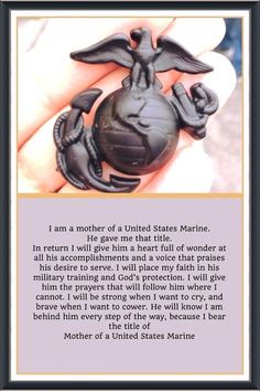 a hand holding a black sea turtle in it's palm with the words i am a mother of a united states marine