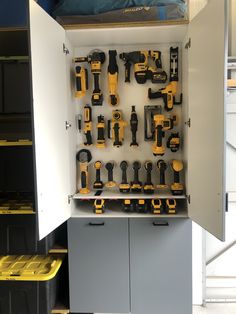 a tool cabinet filled with lots of tools