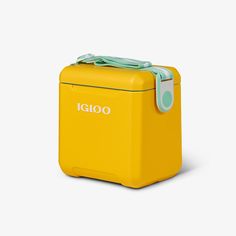 a yellow ice chest with a green handle on it's top and the word igloo written in white