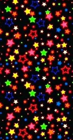 multicolored stars are scattered on a black background