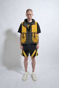 Puffer Vest Styling, Cargo Camper, Cyberpunk Aesthetics, Puffer Vest Fashion, Cargo Vest, Fishing Vest, People Poses, Backpack Style, Puffer Vest