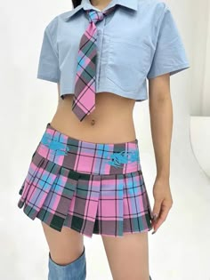 Y2K Aesthetic Gyaru Low Rise Pleated Skirt Size S Waist: 66cm/25.9" Length(waist to hem):24cm/9.4"Size M Waist: 70cm/27.5" Length(waist to hem):25cm/9.8"Size L Waist: 74cm/29.1" Length(waist to hem):26cm/10.2" Size XL Waist: 78cm/30.7" Length(waist to hem):27cm/10.6" Prepare to grab attention with our Y2K Aesthetic Gyaru Low Rise Pleated Skirt. This plaid mini skirt blends early 2000s trends with Japanese gyaru fashion, making it an essential for Harajuku fashion aficionados.Featuring a Y2K-inspired tribal tattoo motif embroidered along the sides and back, this skirt exudes edgy charm, reminiscent of the rebellious spirit of the Y2K era. Its low-rise fit and ultra mini length perfectly embodies the Y2K editorial vibes. Worried about practicality? Fear not! This pink pleated skirt includes Harajuku Style Fitted Mini Skirt For School, School-style Harajuku Mini Skirt, Harajuku Style Fitted Mini Skirt For Summer, Summer Harajuku Fitted Mini Skirt, Harajuku Style Bottoms For School In Spring, Trendy Fitted Skirt For School, Harajuku Mini Skirt For School, Pink Harajuku Fitted Skort, Harajuku Style Mini Skirt For School