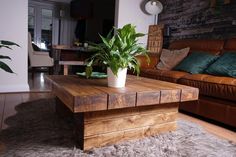 a living room with couches and a coffee table in it's center area