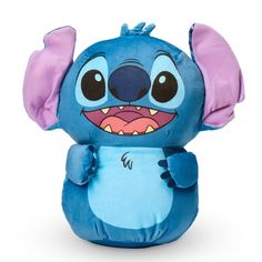 a blue stuffed animal with big ears and an angry look on it's face