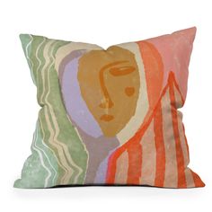 a colorful pillow with a woman's face on it