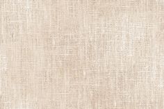 the textured fabric is beige and white