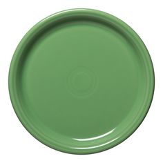 an empty green plate on a white background