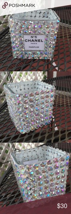 three baskets with chandelier in them on display