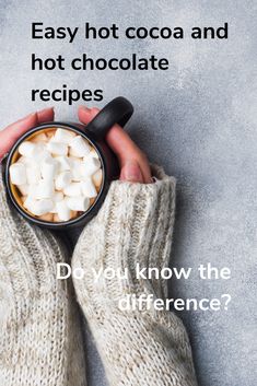 someone holding a cup of hot chocolate with marshmallows in it and the words, easy hot cocoa and hot chocolate recipes do you know the differences?