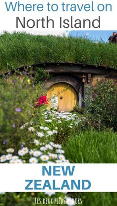 an image of a hobbitton in the middle of flowers and greenery