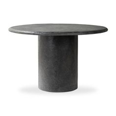 a round table with black marble top