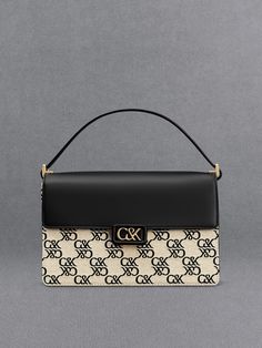 Black Leather & Canvas Monogram Shoulder Bag - CHARLES & KEITH US Modern Monogram Canvas Crossbody Shoulder Bag, Chic Monogram Canvas Shoulder Bag With Detachable Strap, Chic Shoulder Bag With Detachable Strap In Monogram Canvas, Elegant Monogram Canvas Flap Bag With Top Handle, Elegant Top Handle Flap Bag In Monogram Canvas, Modern Monogram Canvas Top Handle Shoulder Bag, Modern Monogram Canvas Evening Shoulder Bag, Modern Monogram Canvas Satchel Shoulder Bag, Modern Monogram Canvas Shoulder Bag With Double Handle