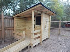 a small wooden structure with steps leading up to it