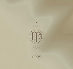 the virgo logo is displayed on a white background with brown and tan colors,