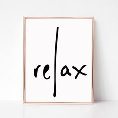 the word relax written in black ink on a white background