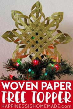 a christmas tree topper made out of paper with lights on it and the words woven paper tree topper