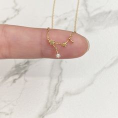 "Beautiful and lovely Gemini zodiac necklace. Made of Sterling Silver with cubic zirconia Gemini charm. Soft and warm looking necklace is good for yourself or gift ! Your necklace will ship in a gift box. Features: Material: Cubic Zirconia, All 92.5Sterling Silver Chain: 14\" + 2 extensions Pendant Size: 1/2\" 💕Zodiac Dates Aquarius / the Water Bearer (Jan 20 - Feb 18) Pisces / the Fishes (Feb 19 - Mar 20 ) Aries / the Ram (Mar 21 - Apr 19) Taurus / the Bull (Apr 20 - May 20) Gemini / the Twins Gemini Necklace, Gemini Jewelry, June Birthday, May Birthday, Constellation Necklace, Cz Stud Earrings, Zodiac Necklaces, Zodiac Jewelry, Celestial Jewelry