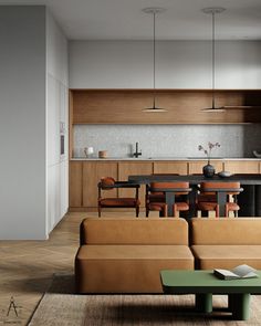 an open living room and dining area in a modern home with wood paneling on the walls