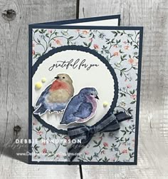 a card with two birds on it