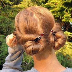 "Reina" translates to "Queen" which is perfect for this stunning Tidal Hair Stick. The large teardrop shaped bead is amazing red Czech glass with a bronze edging. Price is for a single Tidal Hair Stick. The standard base is a 4 1/2 inch black lacquered wood with a unique tapered shape, but after beads are added, the Hair Stick is around 5 1/2 to 6 inches total. A large 6 inch base is available at no additional cost. Most customers prefer to use the smaller 4 1/2 inch base, but you may want to go Hair Damage, Chinese Hairstyle, Hair Stick, Hair Reference, Beautiful Long Hair, Hair Sticks, Aesthetic Hair, Grow Hair, Gorgeous Hair