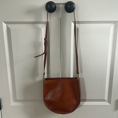 Madewell Transport Crossbody Saddle Bag In Like New Used Condition. Never Carried Purse But There Are Some Minor Scuffs On Leather As Pictured. Smells Like New Leather. One Zipper Compartment And One Magnetic Closure Compartment. From A Smoke Free/Pet Free Home. Brown Saddle Bag With Magnetic Closure For Daily Use, Classic Leather-lined Crossbody Saddle Bag, Black Crossbody Saddle Bag With Magnetic Closure, Brown Leather Saddle Bag With Turn-lock Closure, Brown Leather-lined Crossbody Saddle Bag, Madewell Bags, Crossbody Saddle Bag, Saddle Bag, Magnetic Closure