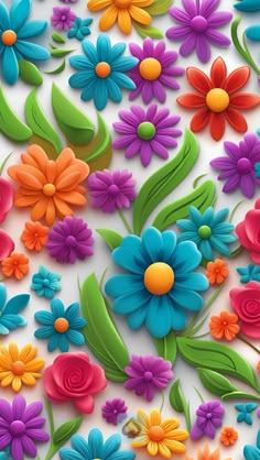 colorful paper flowers and leaves on a white background