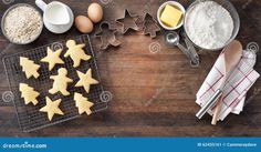 cookies and other ingredients on a wooden table