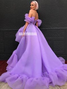 a barbie doll dressed in a purple gown