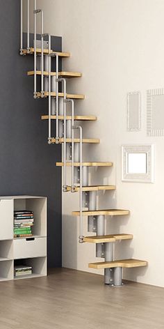 a spiral staircase in an empty room next to a book shelf and bookshelf