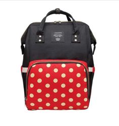 a black and red backpack with polka dots