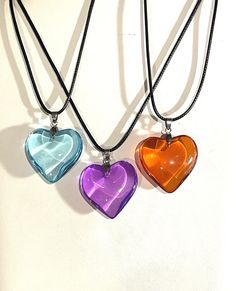 "Large Orange Glass Heart Pendant Necklace , Large Lake Blue Heart , Large Purple Heart , Heart Necklace ,  Cord Necklace / CHOOSE COLOR  Beautiful puffed heart is almost 1 1/4\" wide x 1 1/2\" long including the bale. If you would prefer a ribbon necklace let me know . Please browse through my store, I add items frequently ! Please ask any questions as I do not accept returns but contact me if there is a problem   Thank You !" Fabric Outfits, Cat Ear Headset, Dream Items, Fancy Stuff, Cute Animal Quotes, Rave Accessories, Op Shop, Fairy Jewelry, Necklace Cord