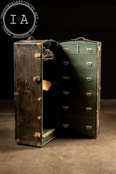 an old suitcase is open and sitting on the floor