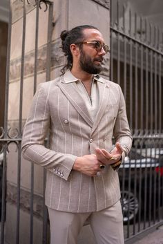 Discover the unique charm of the HolloMen Roman Beige Patterned Double-Breasted Jacket. This eye-catching jacket features a distinctive pattern and a classic double-breasted design, perfect for adding a touch of personality to your winter style.