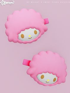 two pink sheep shaped objects on a pink background