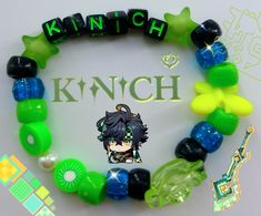 a bracelet made out of glass beads and plastic beads with an anime character on it