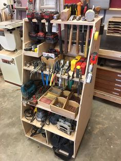 a garage storage unit filled with lots of tools