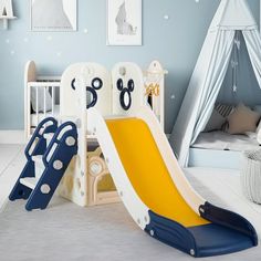 a child's play area with a slide and tent