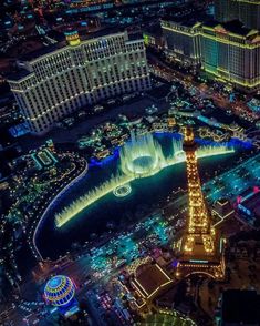 the eiffel tower lit up at night in las vegas, nv as seen from above