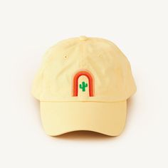 A buttery yellow dad cap with cactus + arch stitching (front) and SideDish stitching (back). Dad jokes not included. Yellow Dad Hat For Summer, Yellow Dad Hat Baseball Cap For Summer, Yellow Cotton Trucker Hat With Curved Brim, Yellow Cotton Dad Hat, Trendy Yellow Snapback Dad Hat, Trendy Adjustable Yellow Dad Hat, Yellow Casual Dad Hat For Spring, Adjustable Yellow Dad Hat Visor, Yellow Adjustable Visor Dad Hat