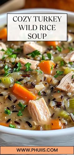 a bowl of cozy turkey wild rice soup with carrots and celery