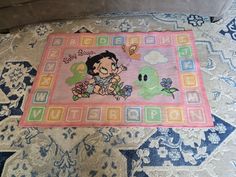 a rug with an image of a cartoon character on it